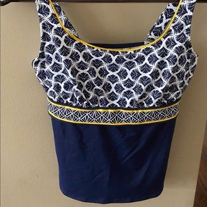 Tankini swim top. Chlorine resistant fabric helps keep its shape. Fabric UPF 50.